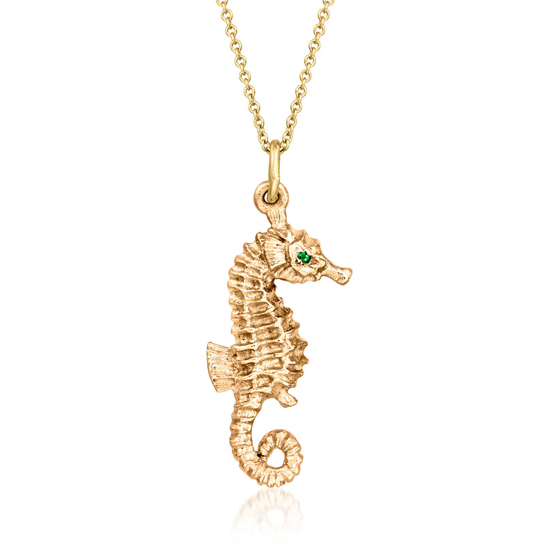 Vintage seahorse pendant necklace in 14kt yellow gold with green emerald eye