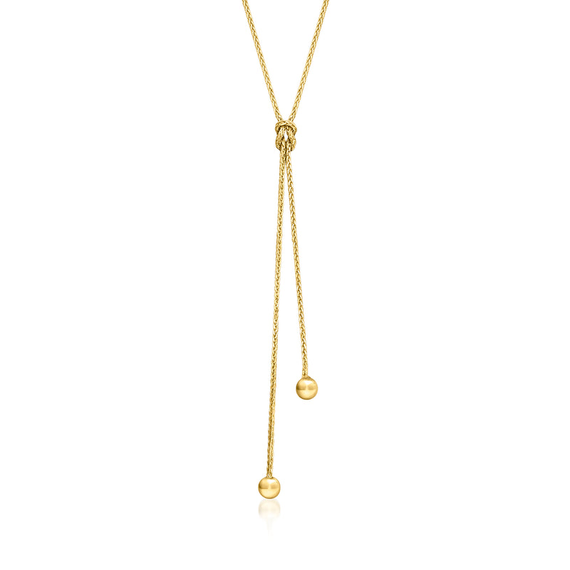14kt yellow gold lariat knot necklace with two round bead drops
