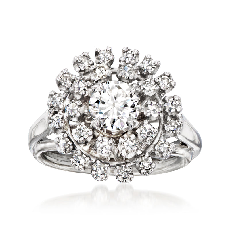 Vintage diamond cluster ring with round center stone, halo of small diamonds, white gold band