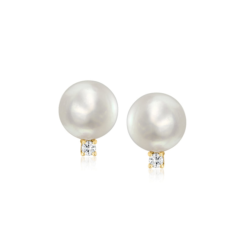 Yellow gold pearl stud earrings with small diamond accents on post backs