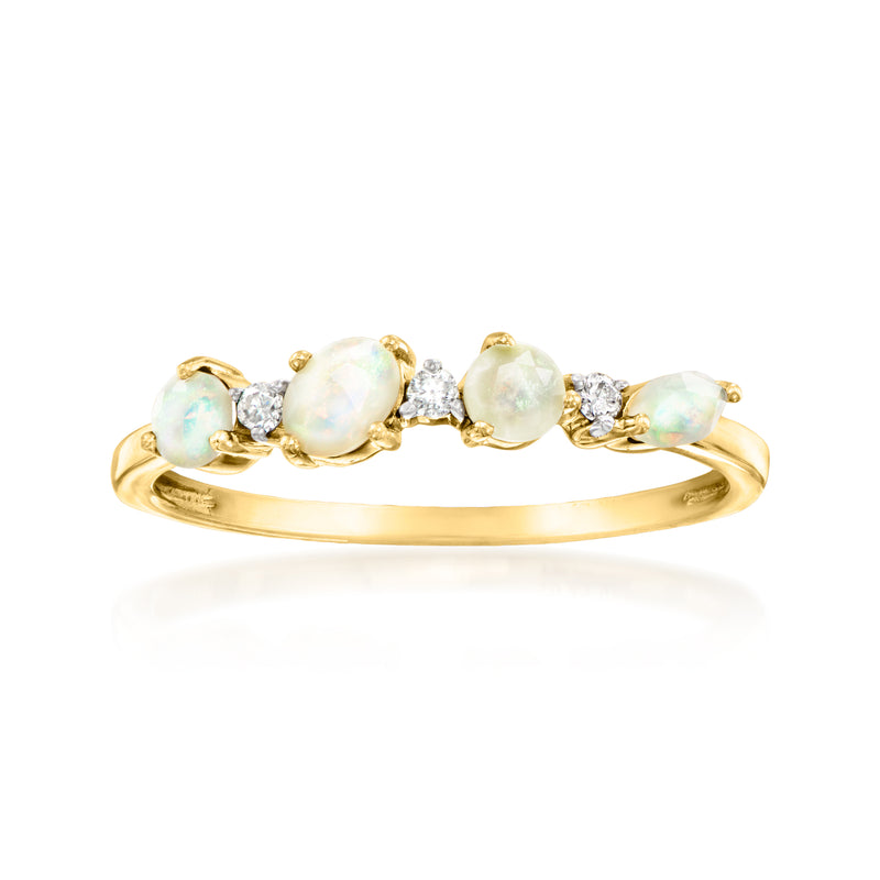 14kt yellow gold ring with three opal cabochons and diamond accents