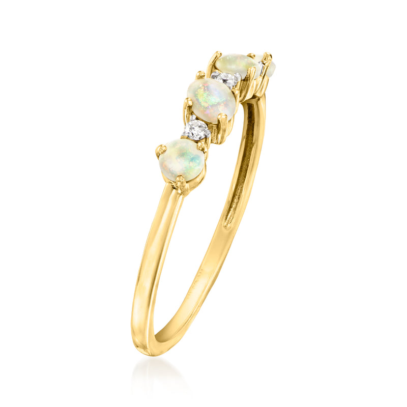 14kt yellow gold opal ring with three oval opals and small diamond set details