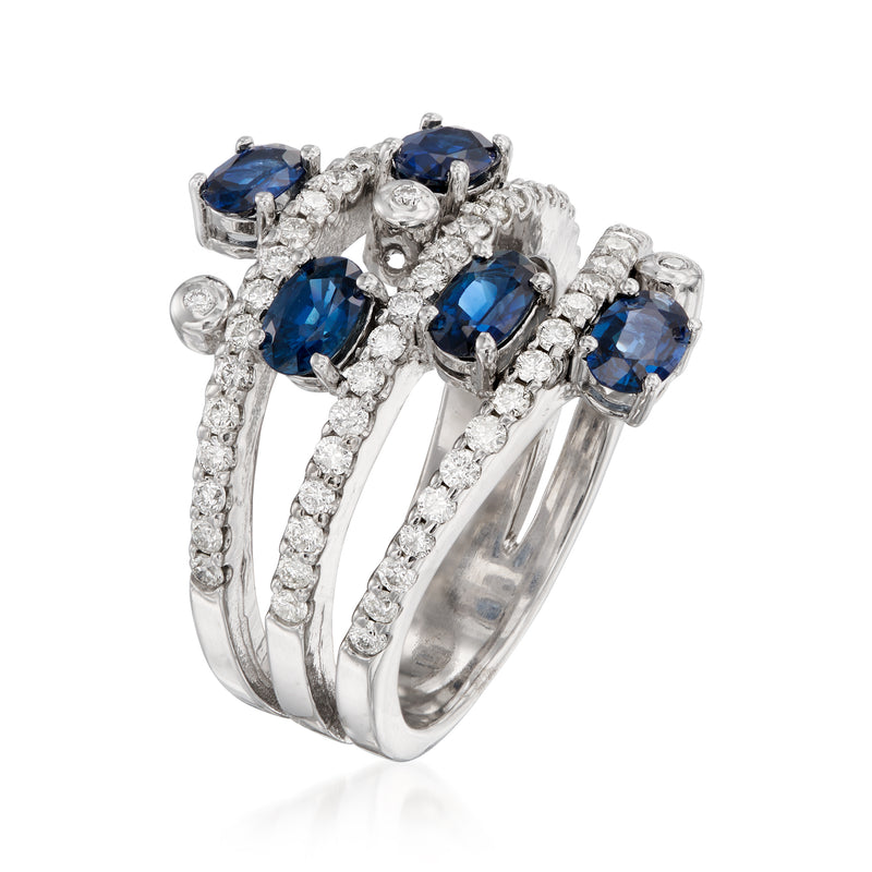 White gold open-space ring with oval blue sapphires and diamond accents, side view