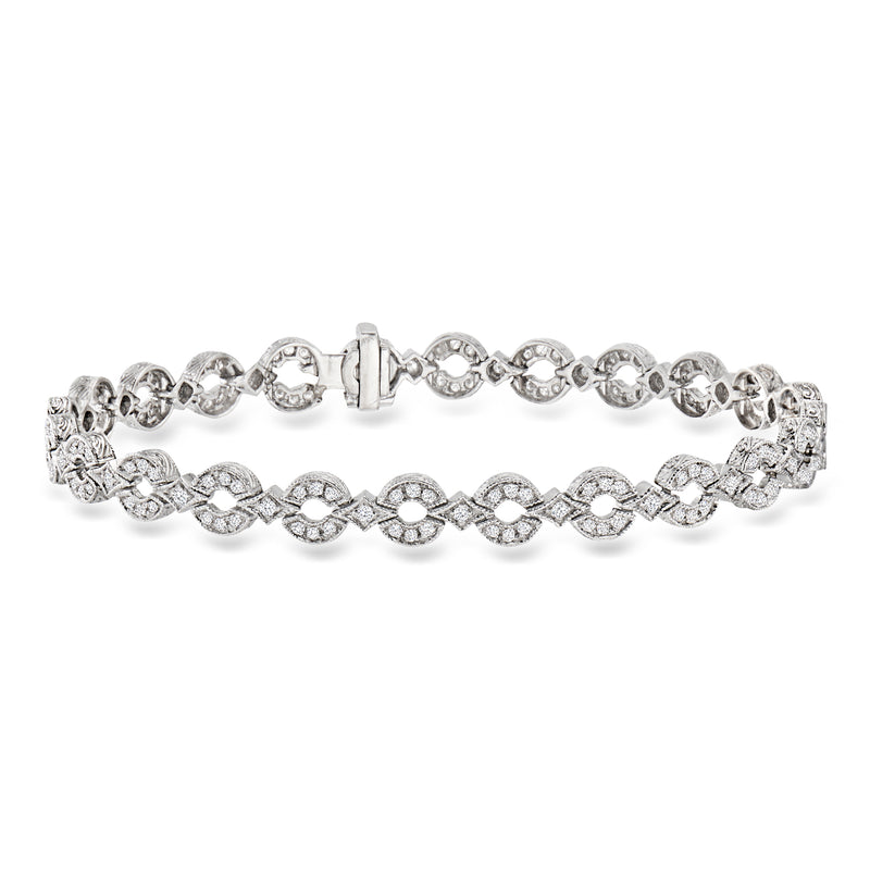 Vintage diamond link bracelet in white gold, linked circles with small round stones