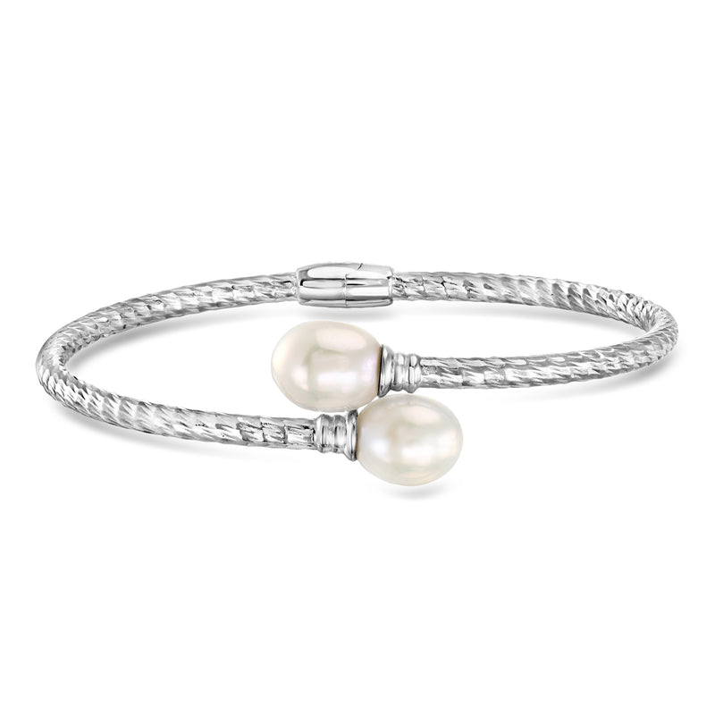Sterling silver cuff bracelet with two cultured pearls and woven clasp