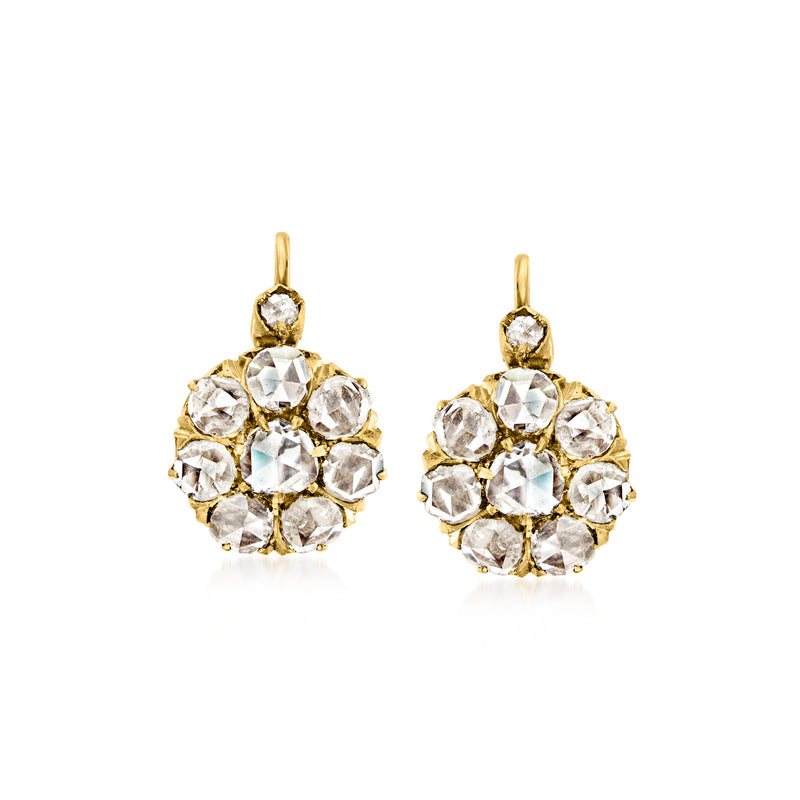Yellow gold flower drop earrings with round diamond-like stones, leverback closure.