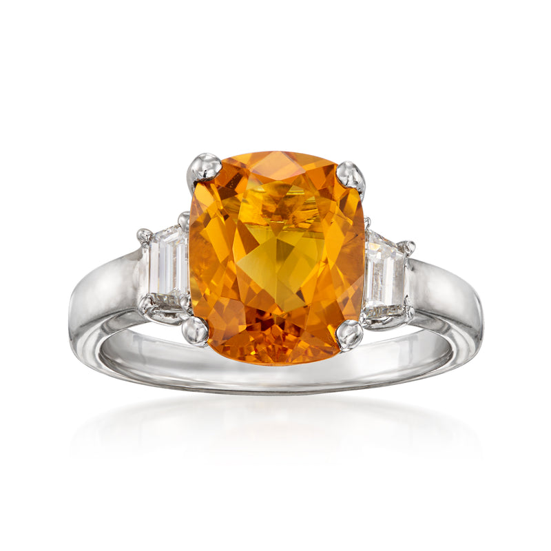 Platinum citrine and diamond ring with large oval orange gemstone center