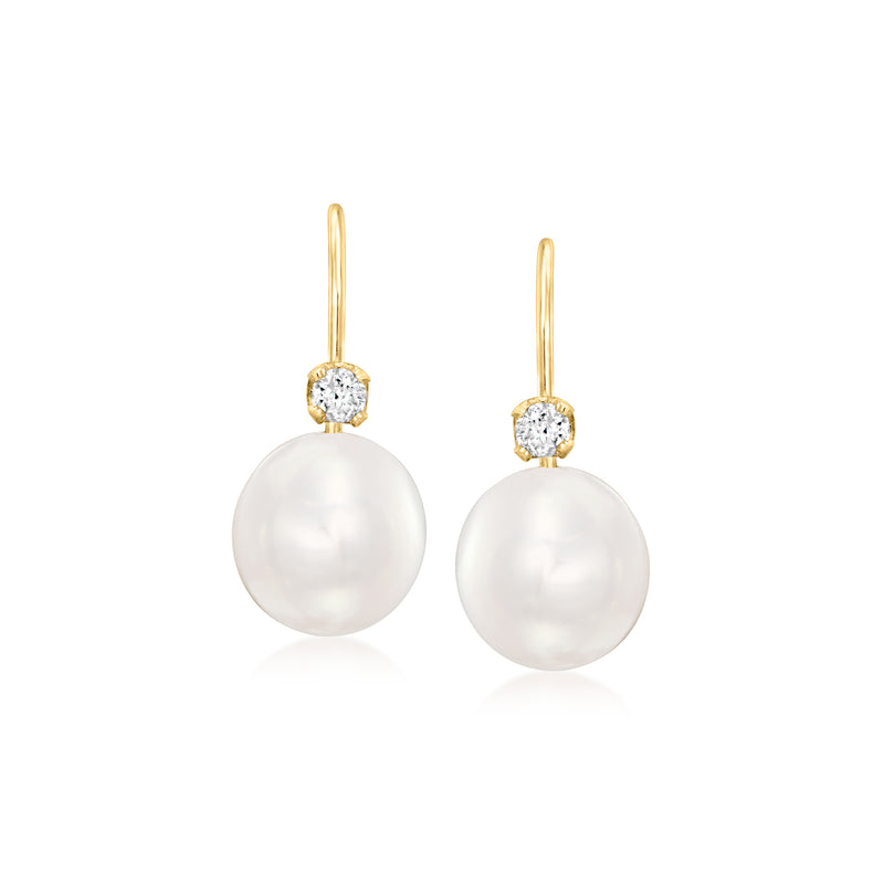 Yellow gold leverback pearl drop earrings with round diamond clusters on white pearls