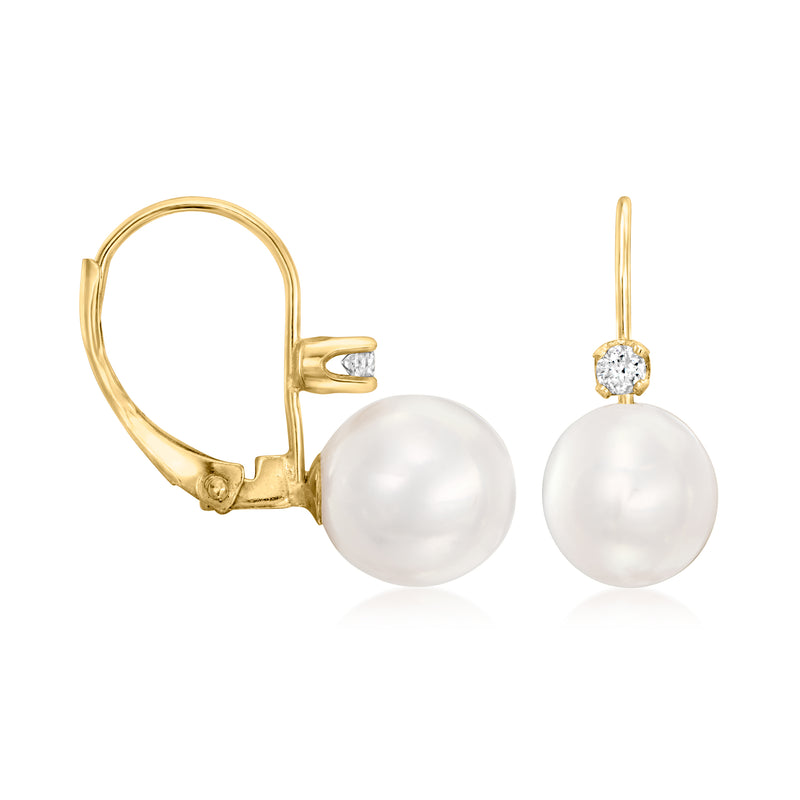 Yellow gold leverback pearl drop earrings, diamond top and large white pearl, side view