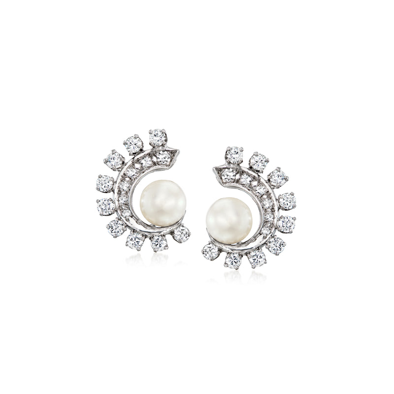 Cultured pearl and diamond swirl stud earrings in white gold with halo of small stones