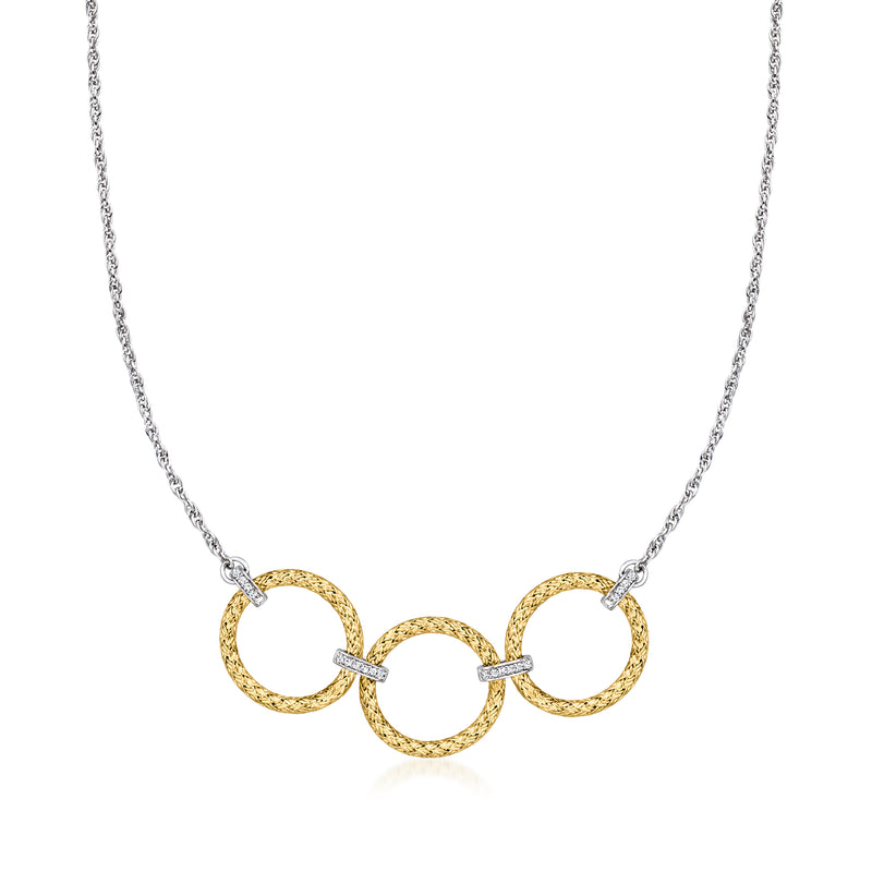 Three linked gold-tone circle pendant necklace on a silver chain