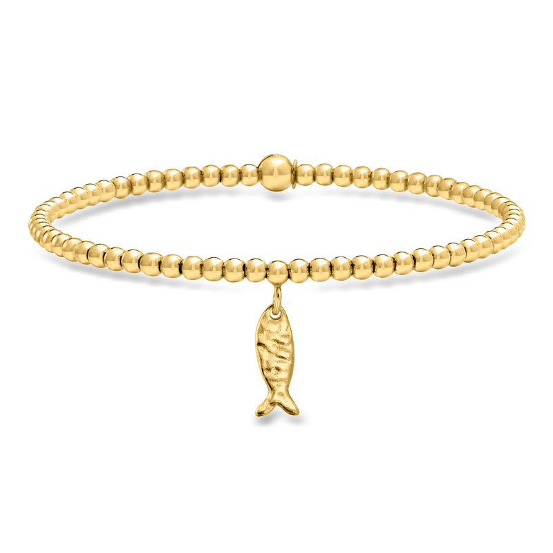 Gold beaded stretch bracelet with dangling fish charm