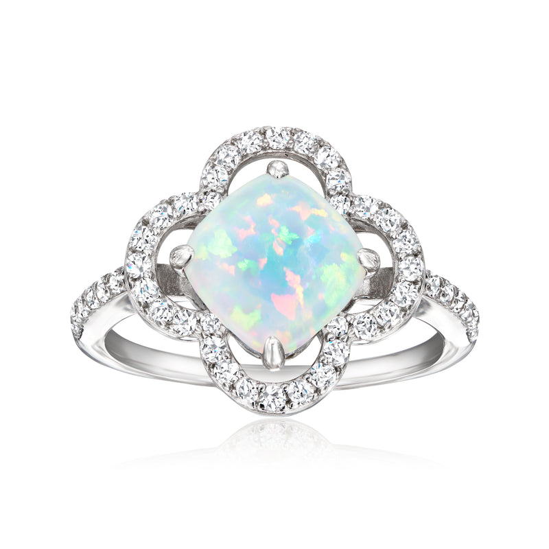 Sterling silver lab-grown opal ring with oval opal center and halo CZ accents