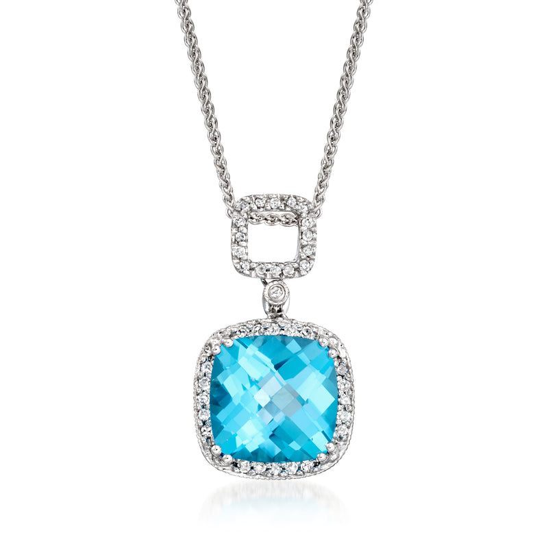 Vintage white gold pendant necklace with blue topaz cushion and diamond halo