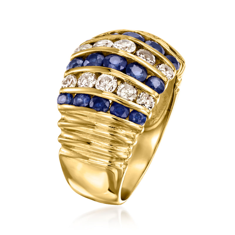 Yellow gold wrap-style ring with stacked blue sapphires and round diamond accents