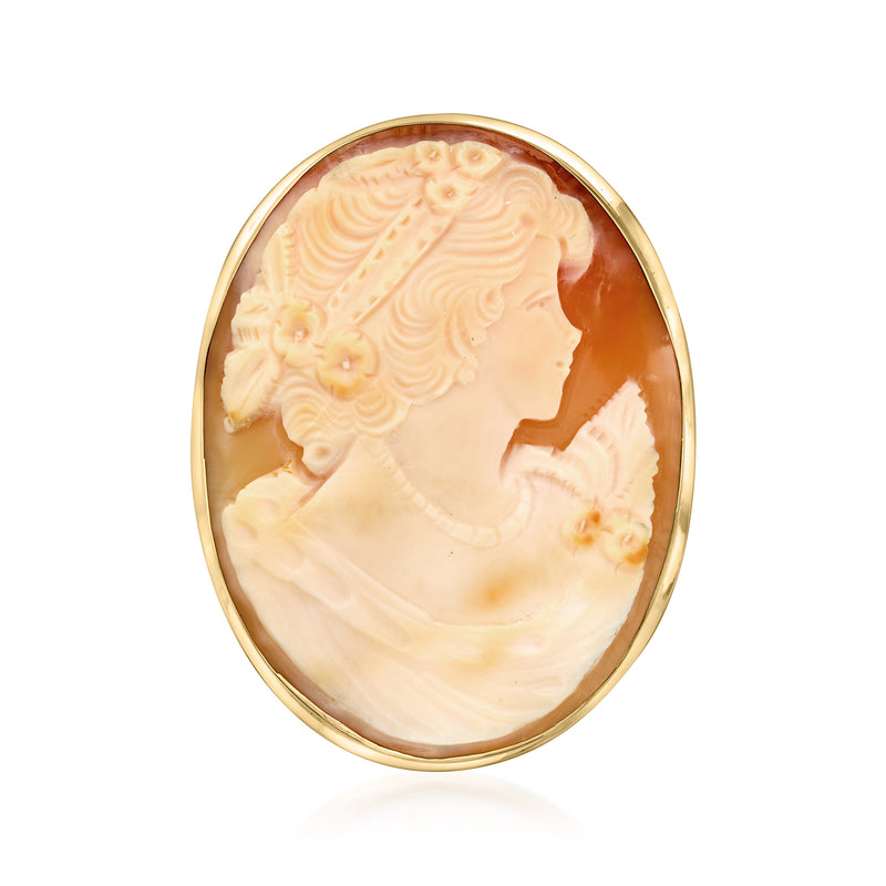 Vintage oval orange shell cameo pin in 14kt yellow gold with engraved portrait