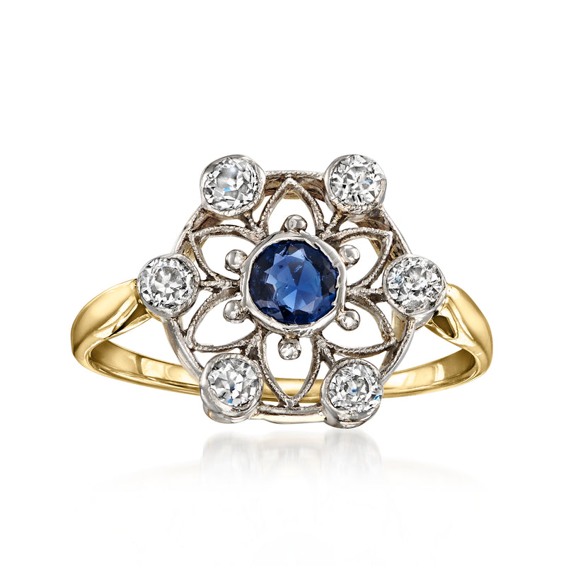 Vintage flower sapphire and diamond ring with blue center stone, platinum setting, yellow gold band