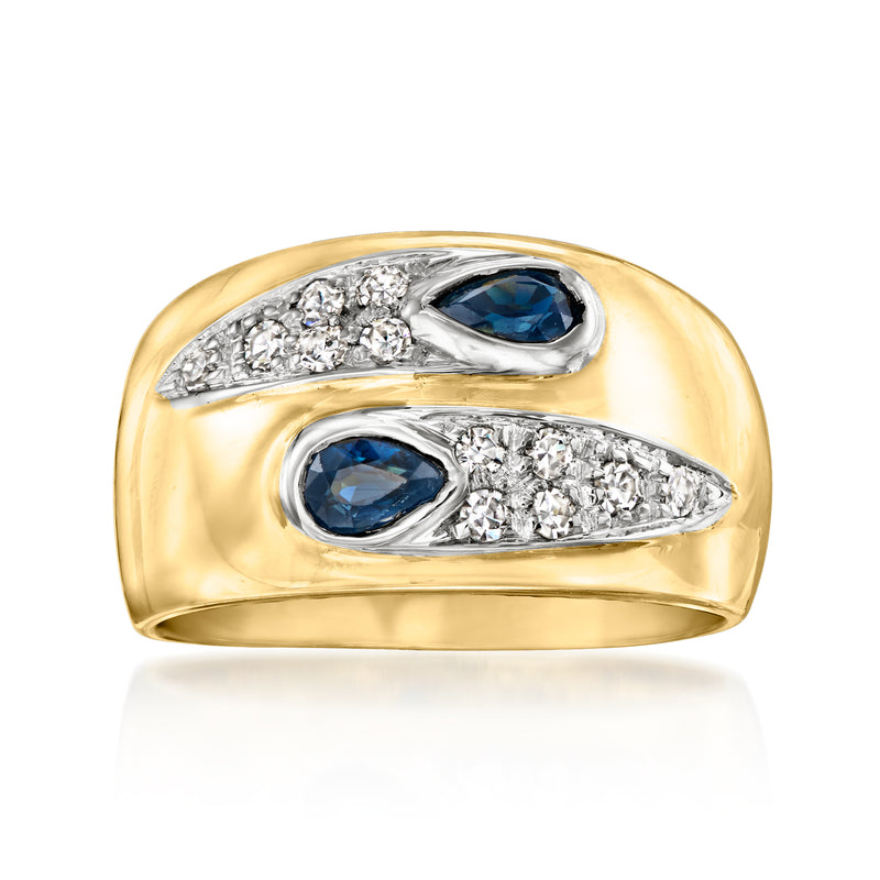 18kt yellow gold vintage ring with blue sapphire oval centers and diamond pave bands