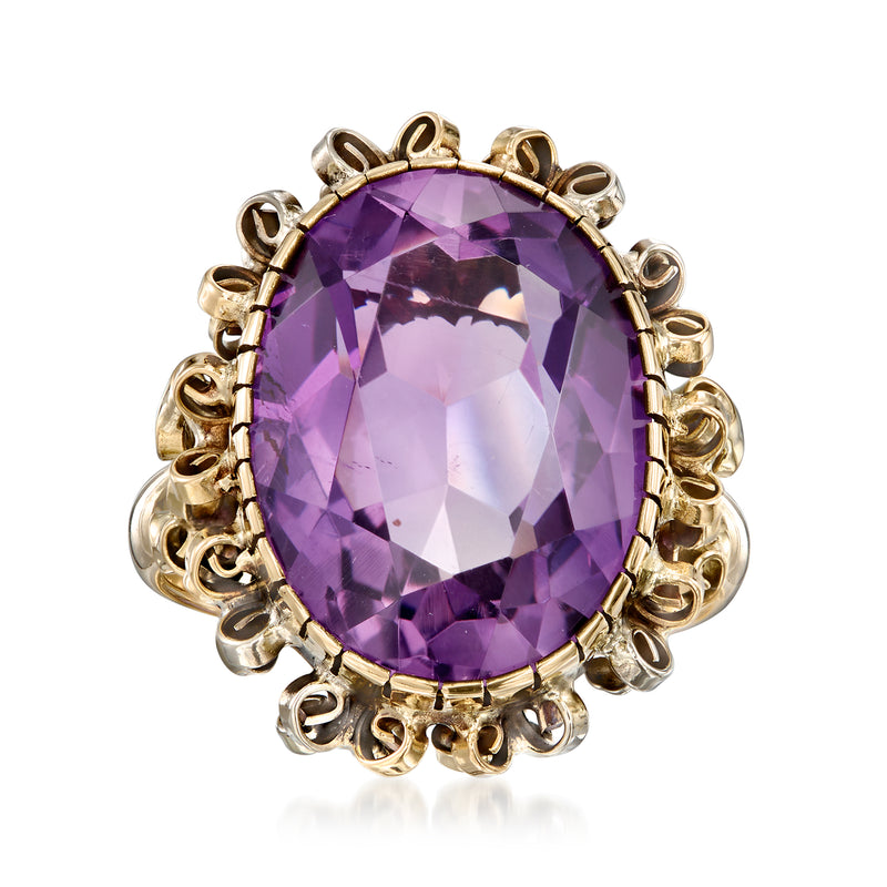Vintage oval amethyst ring with ornate 18kt yellow-gold setting, gemstone bezel prongs