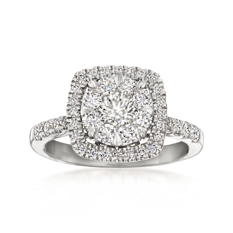 Diamond cluster ring in white gold with a large center stone and halo accents