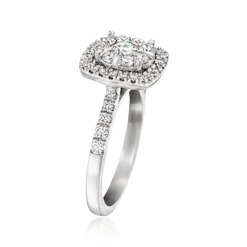 White gold diamond cluster ring with square halo and prong-set side stones