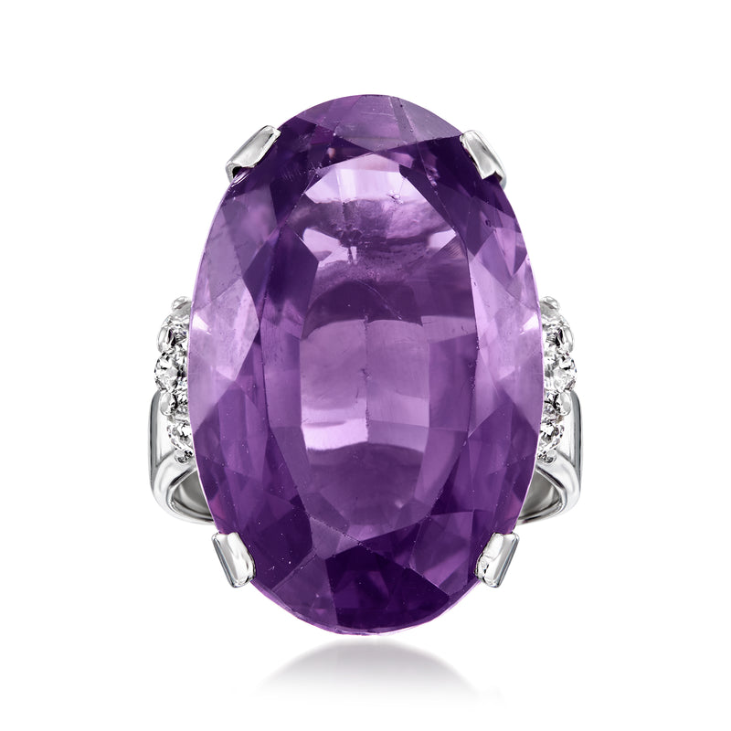 Oval amethyst gemstone ring in white gold with diamond accents and four-prong setting