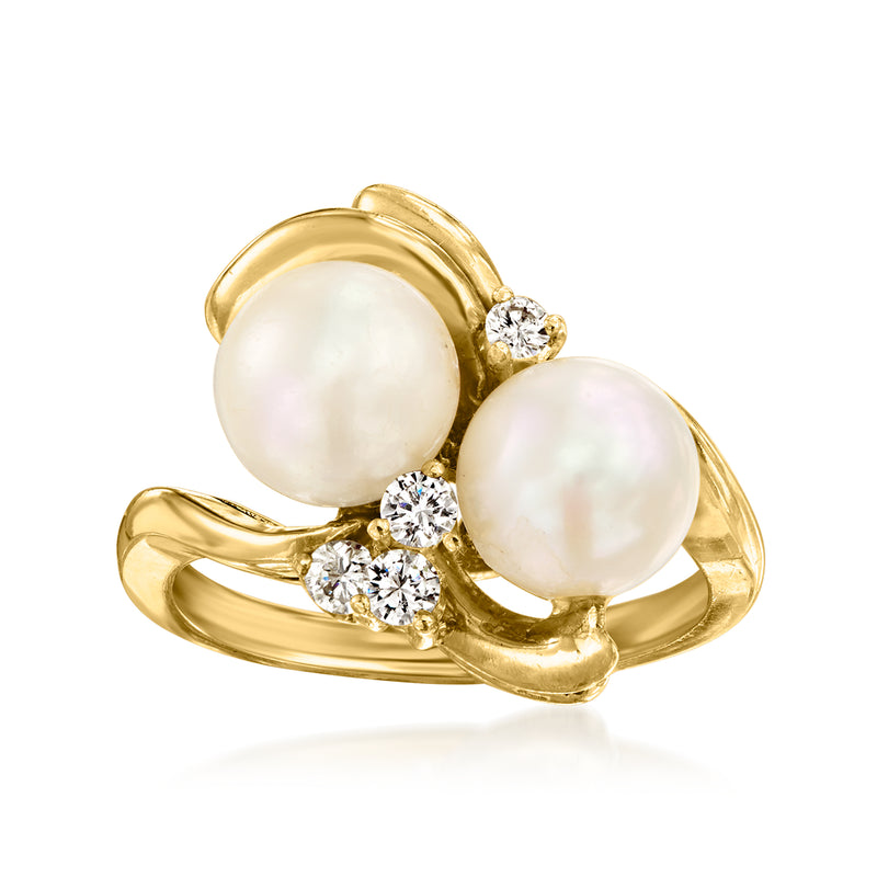 Vintage yellow gold ring with two cultured pearls and diamond accents, three-stone style