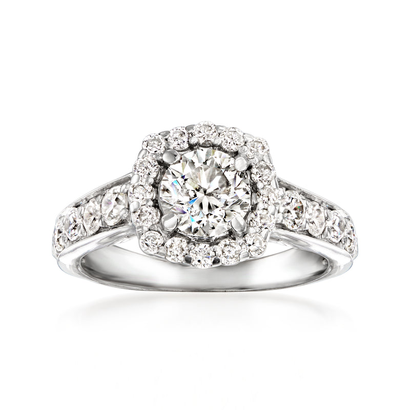 14kt white gold diamond cluster ring with round center stone and halo of small diamonds