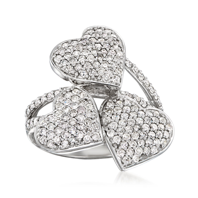 Vintage diamond heart ring in 14kt white gold with three pavé heart settings