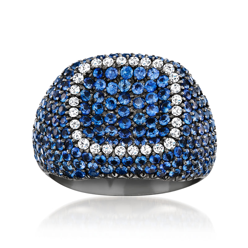 Sapphire dome ring with blue and clear diamond clusters on a white gold band