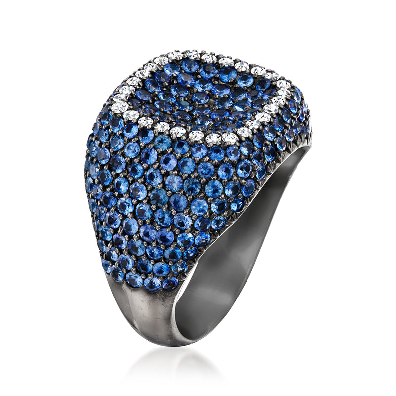 Sapphire and diamond cluster ring with blue stones and white gold band