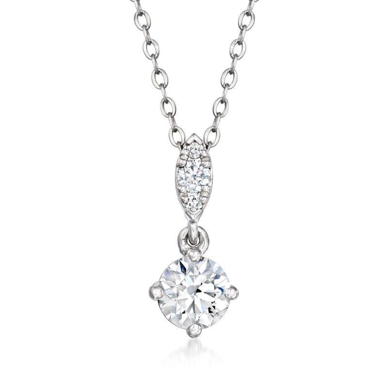 White gold diamond necklace with oval cluster pendant and round center stone