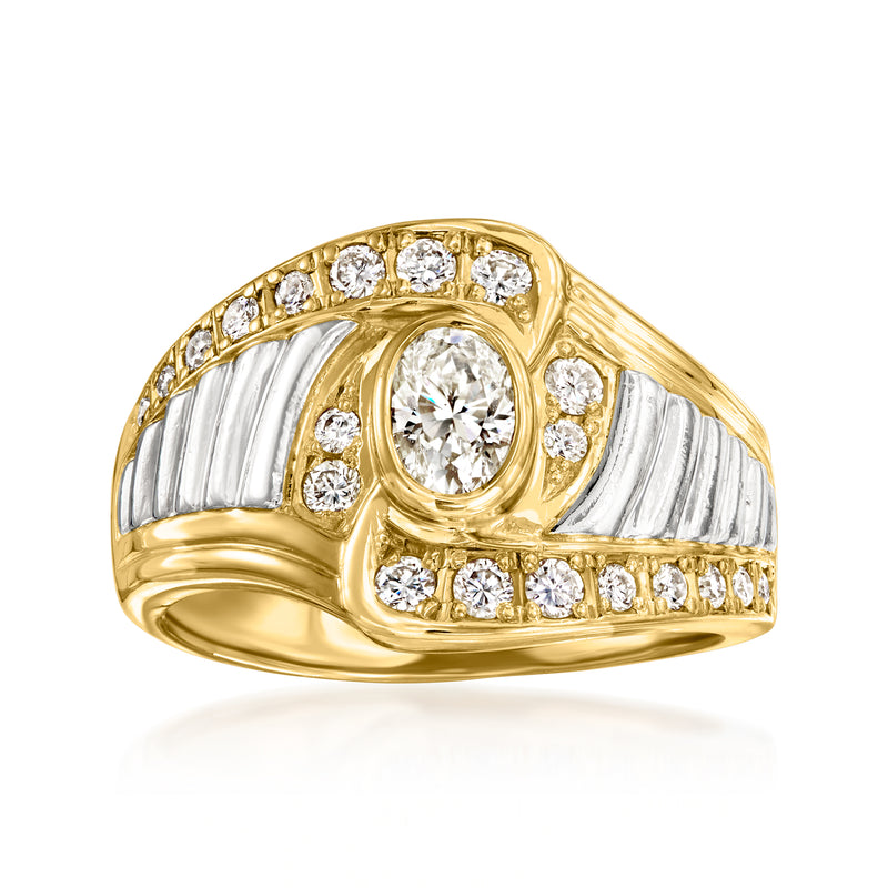 Vintage diamond ring in yellow gold with platinum accents and oval center stone