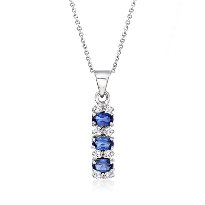 Vintage 18k white gold pendant necklace with three round blue sapphires and diamond accents