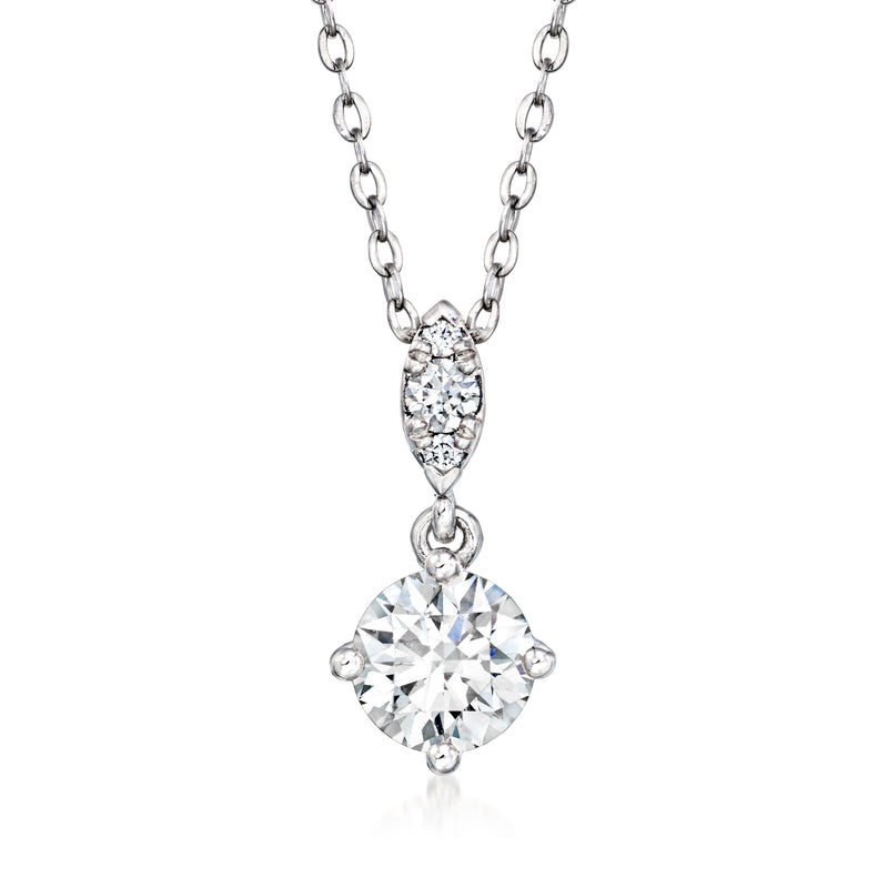 White gold diamond necklace with pear-shaped pendant and circular stone cluster