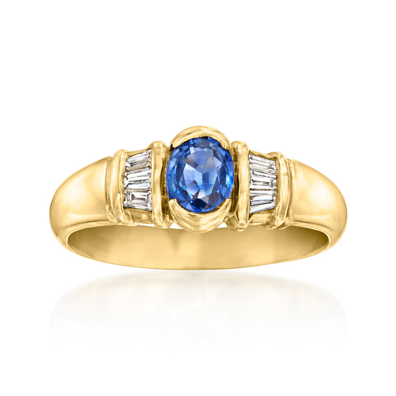 Vintage 18kt yellow gold sapphire and diamond ring with oval blue center stone