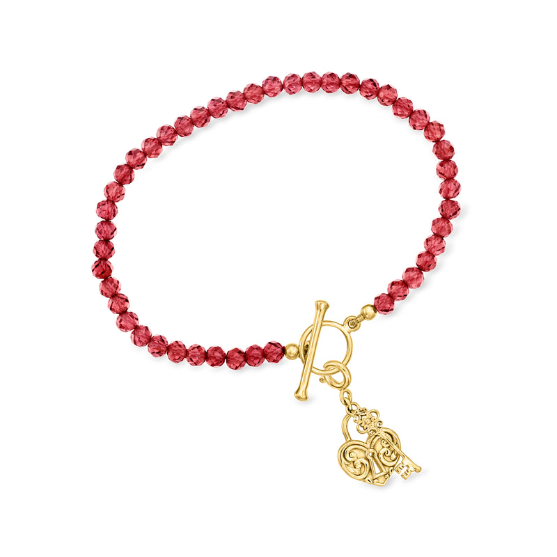 Garnet bead toggle bracelet with gold D clasp and filigree charm dangle