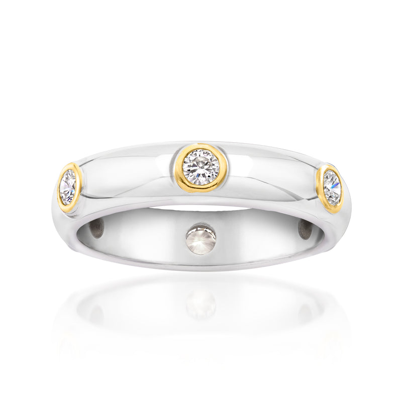 Bezel-set lab-grown diamond ring in sterling silver with gold bezel round center stone