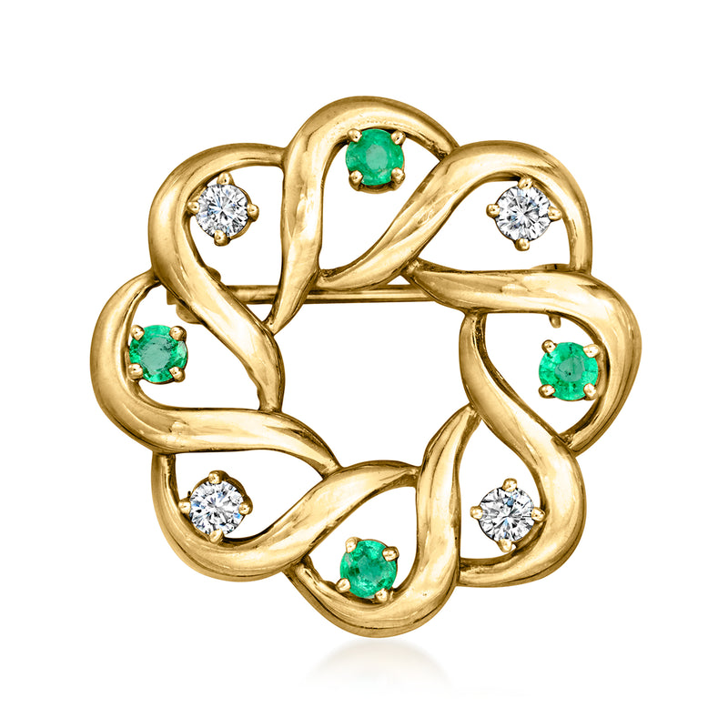 Vintage 14kt yellow gold openwork circle pin with green emeralds and white diamonds