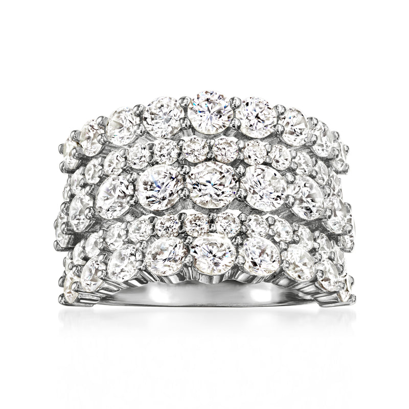Three-row sterling silver CZ ring with round white stones, wide band setting