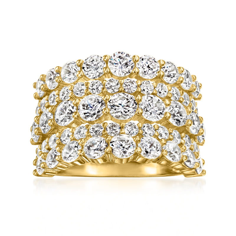 Three-row CZ ring in gold-tone with round clear stones, scalloped bezel settings