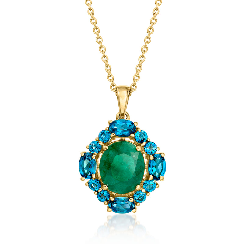 Gold pendant necklace with emerald-green oval center and blue topaz halo on chain