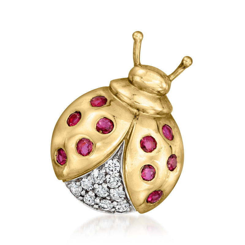 Vintage 14kt yellow gold ladybug pin with ruby-colored stones and diamond accents