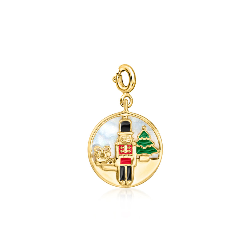 Gold-tone nutcracker scene charm with multicolor enamel and mother-of-pearl circle