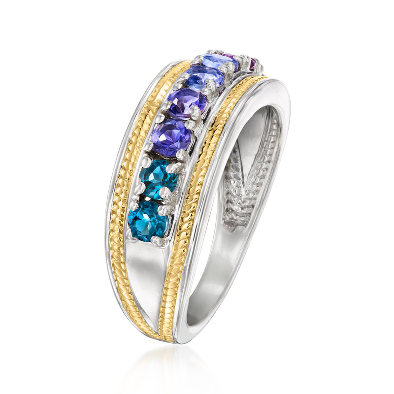 Sterling silver ring with gold-toned bezel and oval blue and purple gemstones