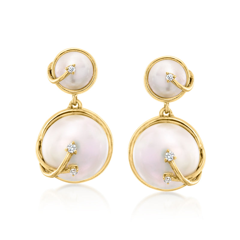Cultured pearl drop earrings in gold tone with small diamond clusters on circular pearls
