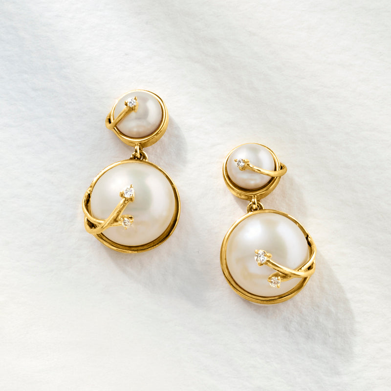 Gold-tone cultured pearl drop earrings with round pearl discs and diamond cluster details