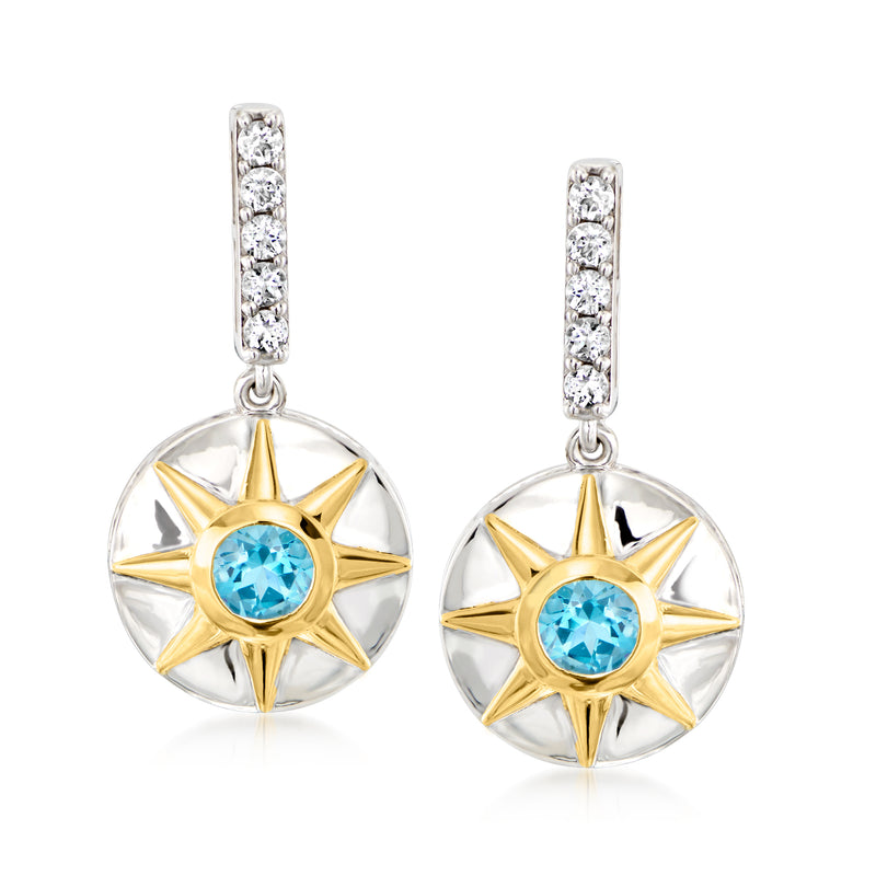Pair sterling silver topaz drop earrings with blue center stone, gold sunburst, and crystal bars