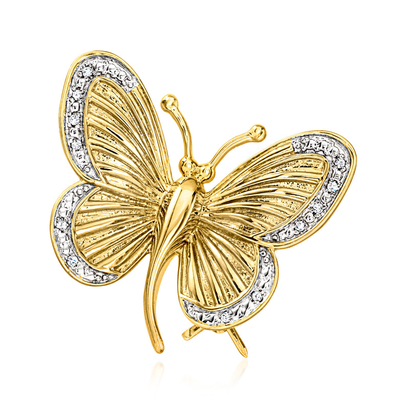Diamond-studded butterfly pin in gold, sculpted wings with sparkling stone borders