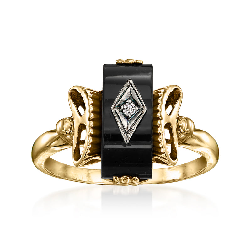 Vintage onyx and diamond ring in 10kt yellow gold with oval bezel detail